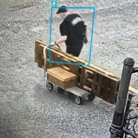 Grant Hardin, a former police chief serving decades-long prison sentences for murder and rape, is seen escaping in a makeshift Arkansas Department of Corrections uniform and pushing a cart loaded with materials.