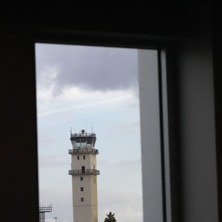 The old air traffic control tower can be seen from Phoenix-Mesa Gateway Airport new south terminal concourse window on Jan. 24, 2024.