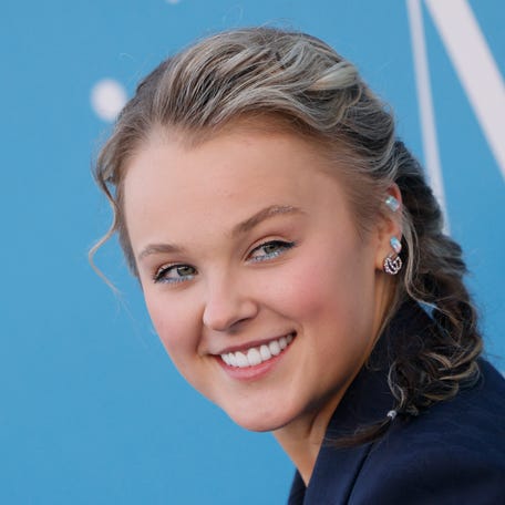 JoJo Siwa arrives for the 2025 Billboard Women in Music, honoring U.S. rapper and singer Doechii as Billboard Woman of the Year, in the YouTube Theater at Hollywood Park in Inglewood, California, on March 29, 2025.