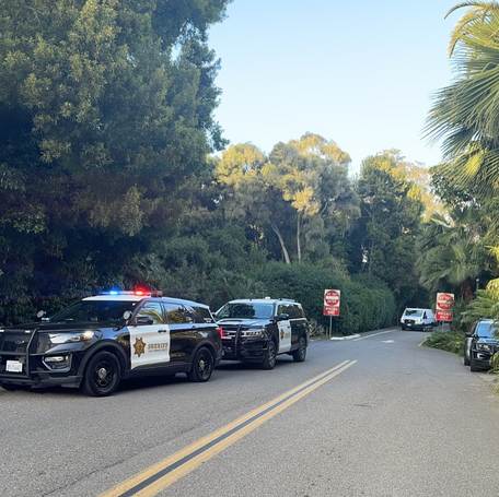 The scene outside the home of Beanie Babies billionaire Ty Warner, where police say a man broke in, assaulted a woman and barricaded himself inside a bathroom.
