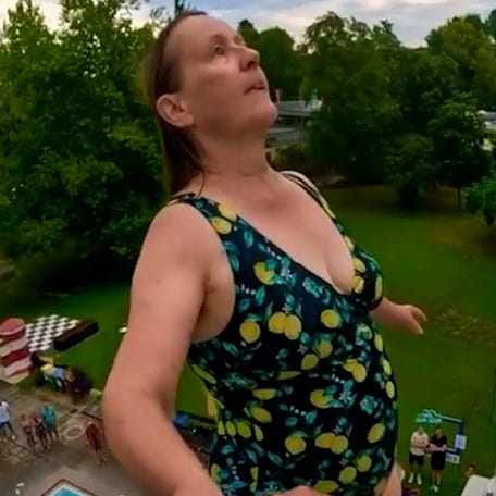 62-year-old, Karen Ali from Trofaiach, Austria, braved her fears and performed a back flip off of a 10 meter high dive.