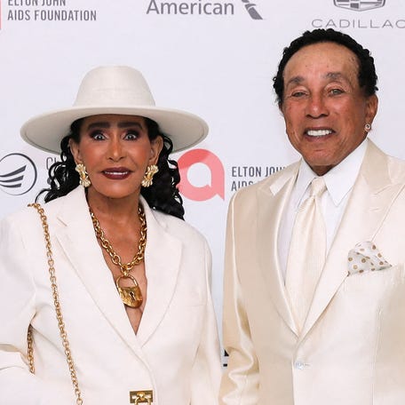 Smokey Robinson and his wife Frances Robinson arrive at the Elton John AIDS Foundation Academy Awards viewing party in Los Angeles on March 10, 2024.