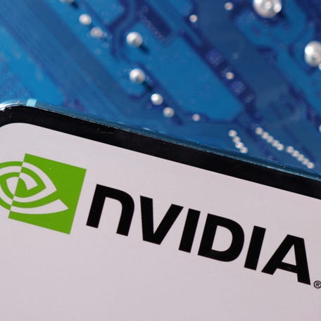 A smartphone with a displayed Nvidia logo is placed on a computer motherboard in this illustration created on March 6, 2023.