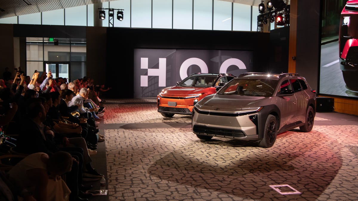 2026 Toyota bZ (foreground) and CH-R electric vehicles at the automaker's North American headquarters in Plano, Texas.