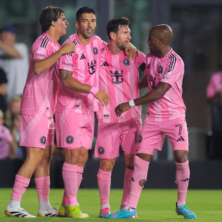 Inter Miami CF forward Luis Suarez (9) celebrates with forward Lionel Messi (10), midfielder Benjamin Cremaschi (30) and midfielder Fafa Picault (7) after scoring against CF Montreal.