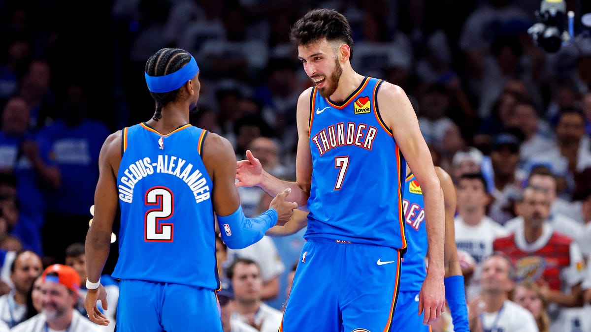 May 28, 2025; Oklahoma City, Oklahoma, USA; Oklahoma City Thunder forward Chet Holmgren (7) and guard Shai Gilgeous-Alexander (2) celebrates during the second quarter against the Minnesota Timberwolves in game five of the western conference finals for the 2025 NBA Playoffs at Paycom Center. Mandatory Credit: Alonzo Adams-Imagn Images