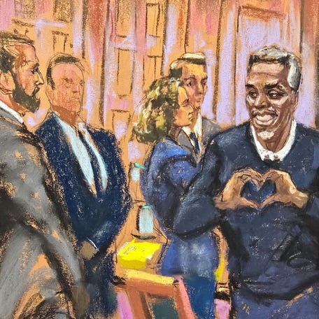 Sean "Diddy" Combs makes a heart gesture as he enters the coutroom for his sex trafficking trial in New York City, New York, U.S., May 28, 2025 in this courtroom sketch.