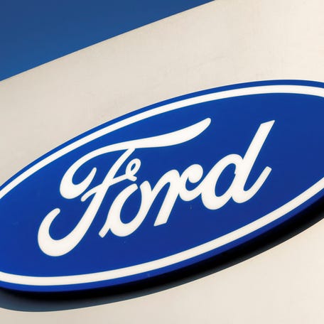 A logo of Ford is seen outside a Ford car dealer in Arnhem, Netherlands February 18, 2025.