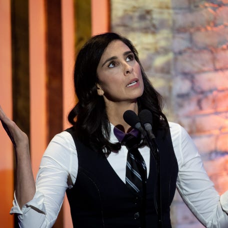 Comedian Sarah Silverman presents an award to Patty Griffin during the 2023 Americana Music Association Awards and Honors in Nashville, Tennessee.