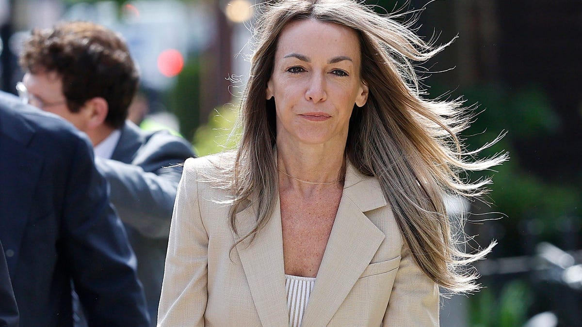 Karen Read walks to court for her murder trial at Norfolk Superior Court in Dedham, Massachusetts, on Wednesday, May 28, 2025.