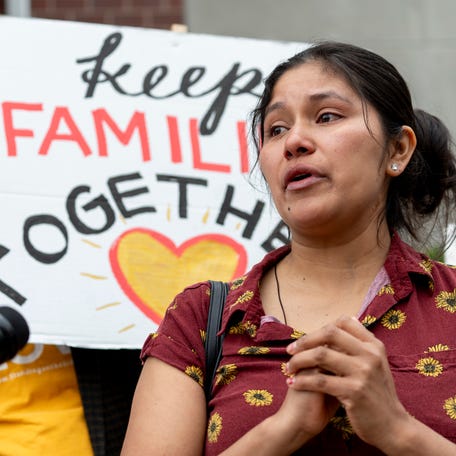 A teacher's aide from El Salvador attends an anti-deportation rally outside the U.S. Immigration and Customs Enforcement office on May 30, 2025, in Milwaukee, Wisconsin.