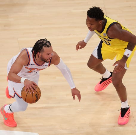 New York Knicks guard Jalen Brunson (11) controls the ball against Indiana Pacers guard Bennedict Mathurin (00) during the second quarter of Game 5 of the Eastern Conference finals at Madison Square Garden.