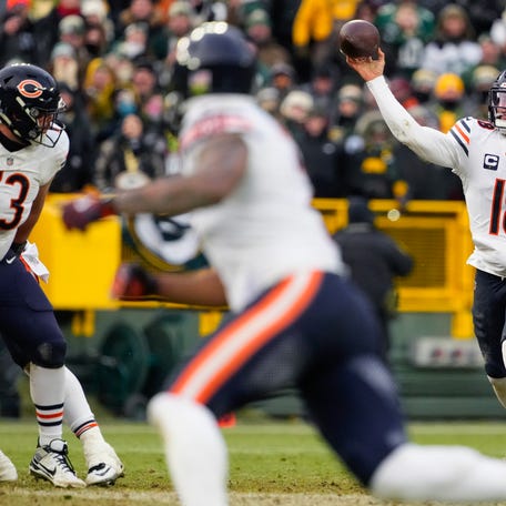 Jan 5, 2025; Green Bay, Wisconsin, USA; Chicago Bears quarterback Caleb Williams (18) during the game against the Green Bay Packers at Lambeau Field. Mandatory Credit: Jeff Hanisch-Imagn Images