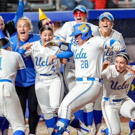 UCLA catcher Alexis Ramirez (28) runs home after hitting a home run in the fourth inning during a softball game between UCLA and Oregon.