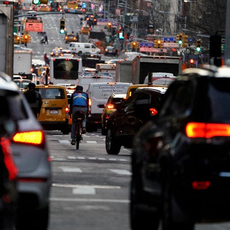 FILE PHOTO: Traffic is pictured at twilight along 2nd Ave. in the Manhattan borough of New York, U.S., March 27, 2019. REUTERS/Carlo Allegri/File Photo