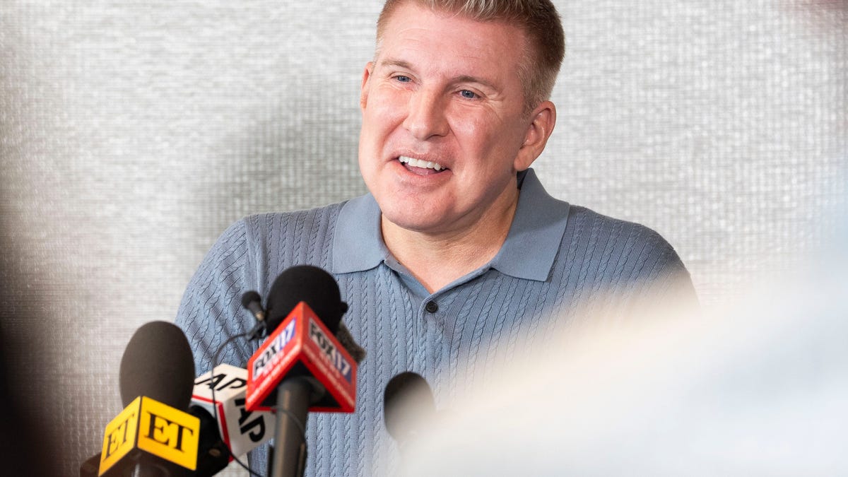 Todd Chrisley answers questions during a May 30, 2025, press conference at Nashville's Kimpton Aertson Hotel with daughter Savannah Chrisley and his legal team a day after he was released from prison following a full pardon from President Donald Trump.