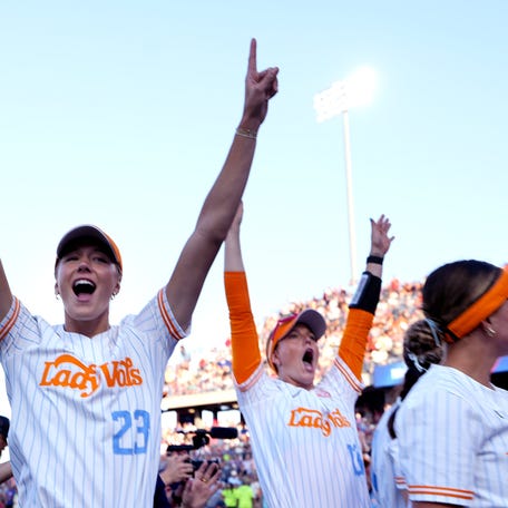 Tennessee's Karlyn Pickens (23) and Emma Clarke (13) celebrate following the Women's College World Series softball game between the Florida Gators and the Tennessee Volunteers at Devon Park in Oklahoma City, Friday, May, 30, 2025.