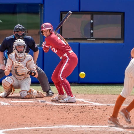 Texas starting pitcher Teagan Kavan (17) pitches to Oklahoma infielder Nelly McEnroe-Marinas (2) in the second inning during a softball game between UCLA and Oregon at the Women's College World Series at Devon Park in Oklahoma City, on Saturday, May 31, 2025.
