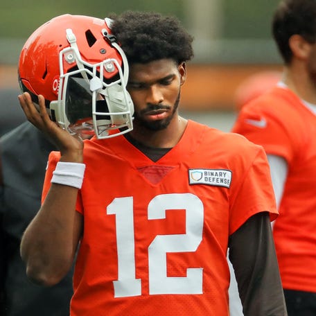 Shedeur Sanders listens to the play calling on the sideline during a practice at the Cleveland Browns training facility on May 28, 2025, in Berea, Ohio.