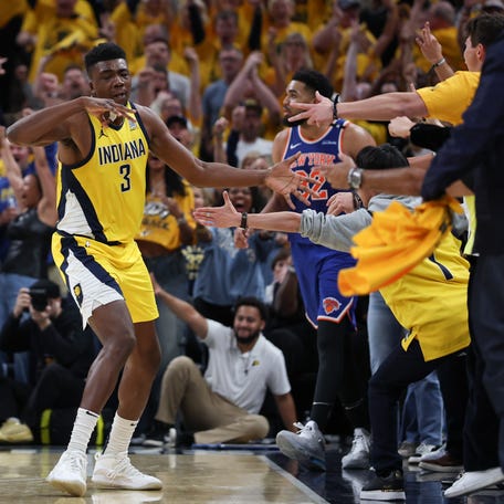 Game 6: The Indiana Pacers' Thomas Bryant celebrates after 3-point basket against the New York Knicks.