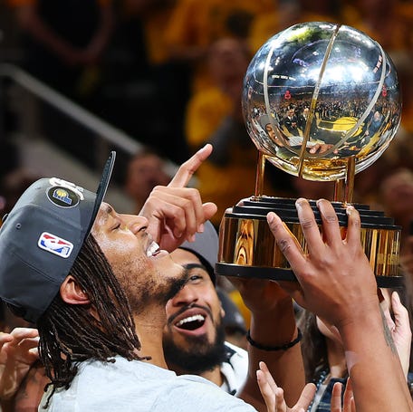 Myles Turner and the Pacers celebrate winning the Eastern Conference championship.