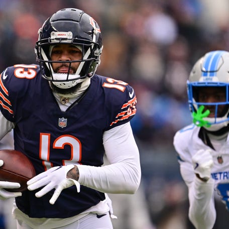 Dec 22, 2024; Chicago, Illinois, USA; Chicago Bears wide receiver Keenan Allen (13) runs after a catch against the Detroit Lions during the second quarter at Soldier Field. Mandatory Credit: Daniel Bartel-Imagn Images