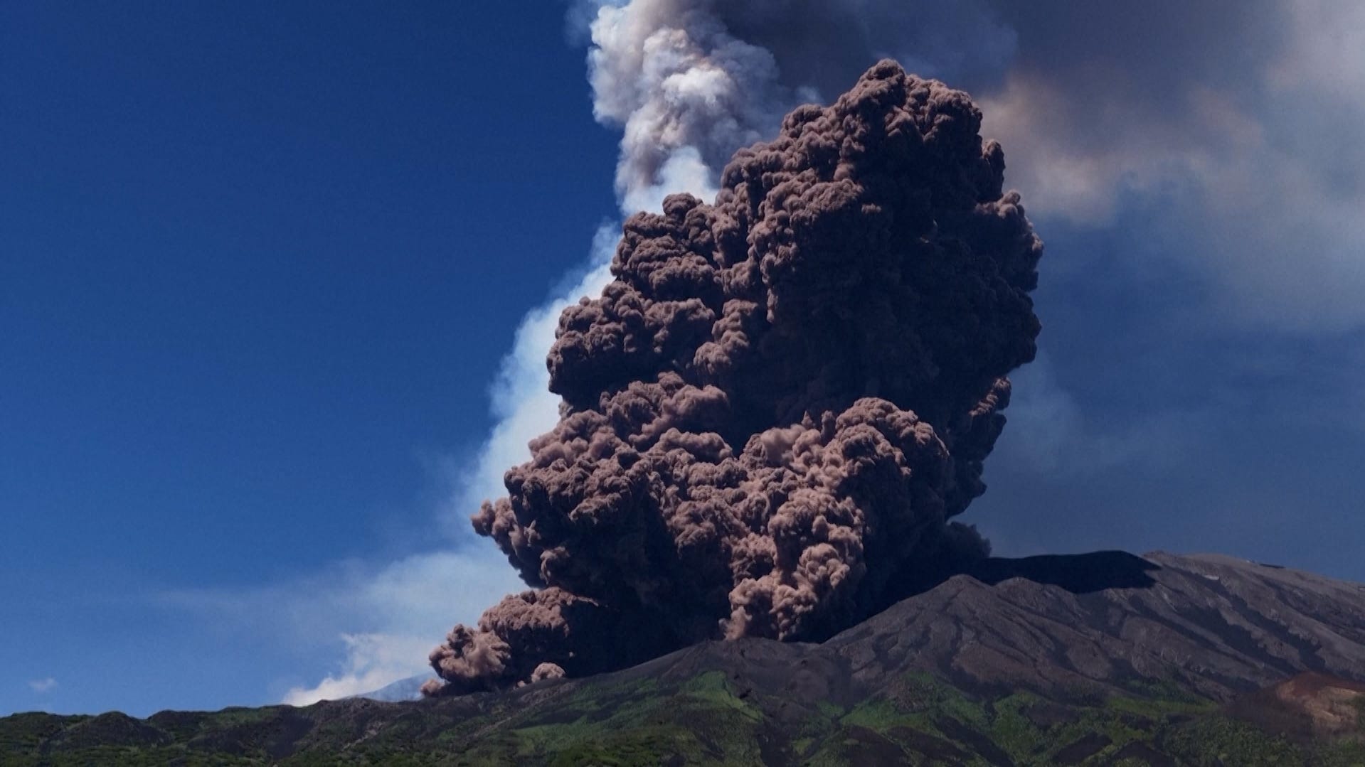 Tourists run for their lives as Mount Etna erupts with huge ash plumes