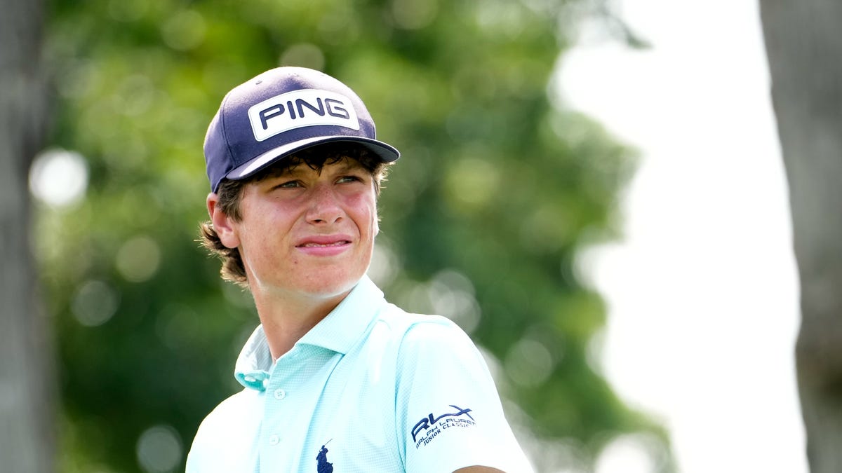 Mason Howell of the United States watches his shot from the 16th tee during day two of the 76th U.S. Junior Amateur Championship on the South Course at Oakland Hills Country Club on July 23, 2024 in Bloomfield Hills, Michigan.