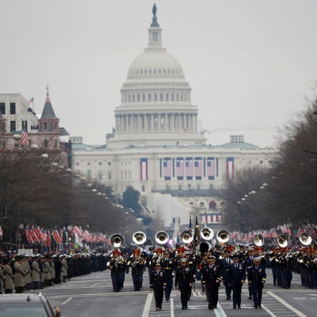 FILE PHOTO: The U.S. Army band "Pershing's Own" marches in the parade carrying U.S. President Donald Trump following his inauguration in Washington, U.S., January 20, 2017.  REUTERS/Joshua Roberts/File Photo