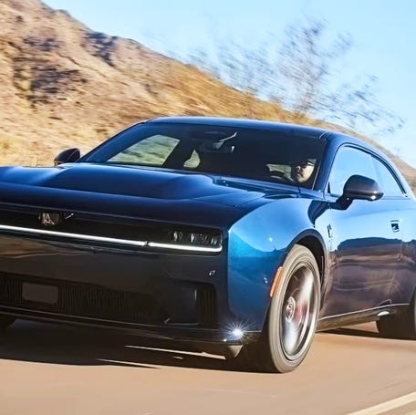 A blue Dodge Charger Daytona EV.