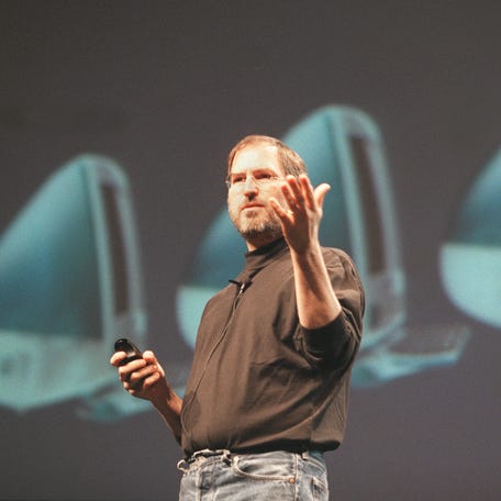 Apple Computers acting head Steve Jobs presents Apple's new iMac computer at the Paris Apple Expo 17 September.