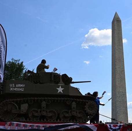People in a US Army tank participate in the National Memorial Day Parade on Constitution Avenue in Washington, DC, May 26, 2025.
