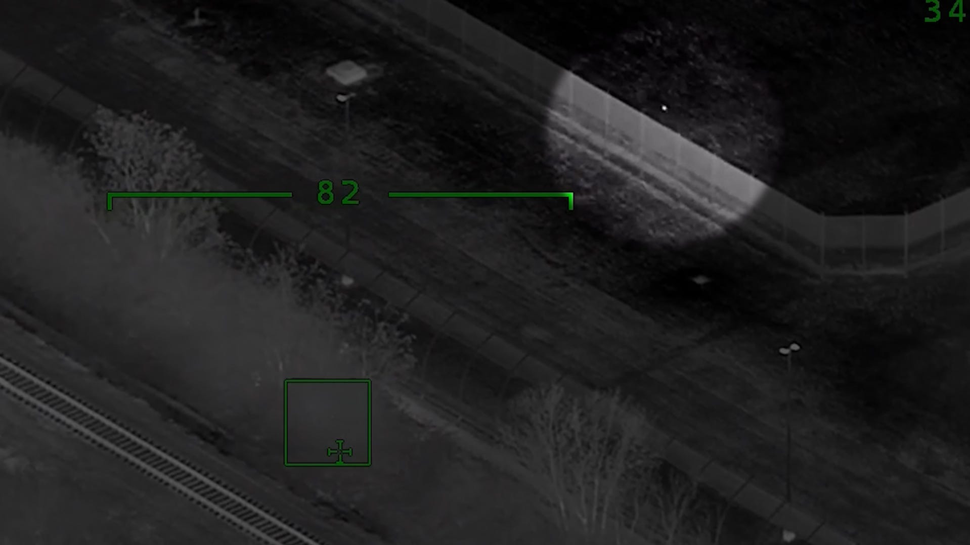 Ohio Patrol helicopter video captures men throwing package over youth prison fence Ohio Patrol helicopter video captures men throwing package over youth prison fence