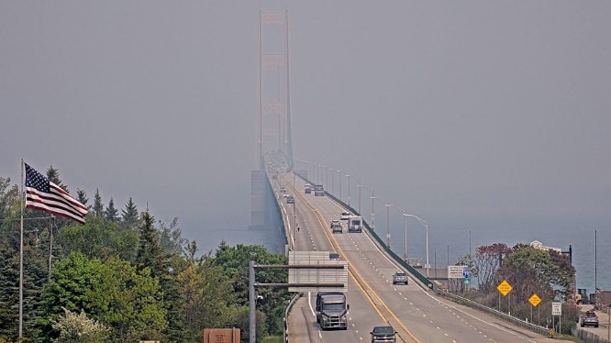 Canadian wildfire smoke engulfs Michigan's Mackinac Bridge ...