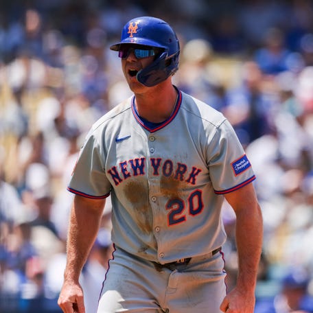 New York Mets first base Pete Alonso (20) celebrates after scoring a run against the Los Angeles Dodgers during the second inning on June 5, 2025, at Dodger Stadium.