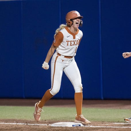 Reese Atwood celebrates during Game 1 of the WCWS finals.