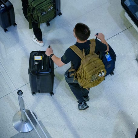 Experts advise travelers from countries covered by the latest travel ban not to come to the U.S.