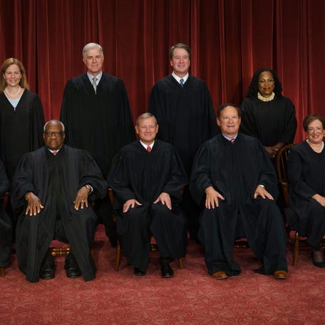 The Supreme Court from left, Justices Sonia Sotomayor, Amy Coney Barrett, Clarence Thomas and Neil Gorsuch, Chief Justice John Roberts, and Justices Brett Kavanaugh, Samuel Alito, Ketanji Brown Jackson and Elena Kagan.
