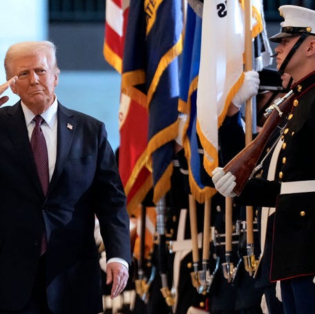 President Donald Trump reviews the troops during his Inauguration ceremony in Emancipation Hall of the US Capitol in Washington, DC, on January 20, 2025.