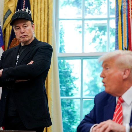 FILE PHOTO: U.S. President Donald Trump and Elon Musk attend a press conference in the Oval Office of the White House in Washington, D.C., U.S., May 30, 2025. REUTERS/Nathan Howard/File Photo