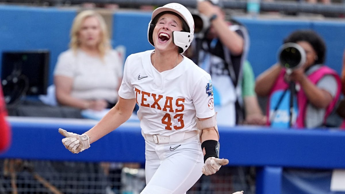 Texas shortstop Leighann Goode (43) celebrates after a home run against Texas Tech during the third game of the Women's College World Series championship series at Devon Park, Friday, June, 6, 2025, in Oklahoma City.