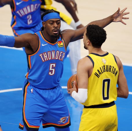 OKLAHOMA CITY, OKLAHOMA - Luguentz Dort #5 of the Oklahoma City Thunder defends the inbound against Tyrese Haliburton #0 of the Indiana Pacers during the first quarter in Game Two of the 2025 NBA Finals at Paycom Center on June 08, 2025. (Photo by William Purnell/Getty Images)