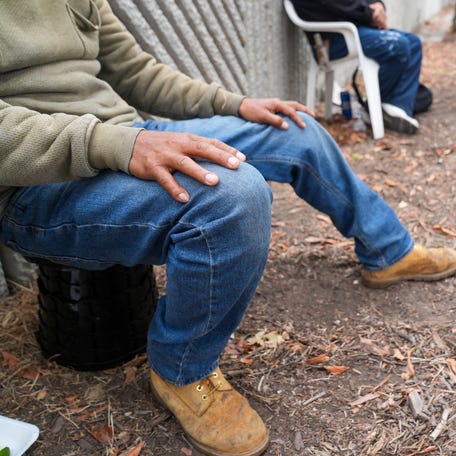 Day laborers waiting for work at the Home Depot in Paramount, California, on June 9, 2025, risk ICE detention and deportation but said they were willing to take the risk because they need money to support their families.