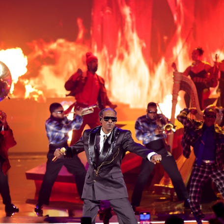 Snoop Dogg performs onstage.