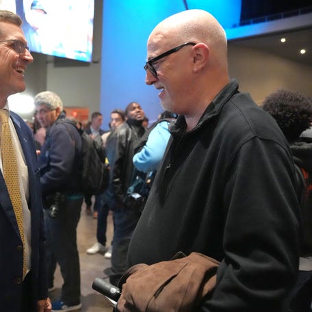 Los Angeles Times columnist Bill Plaschke is shown here with Jim Harbaugh at an introductory press conference at YouTube Theater at SoFi Stadium in 2024.