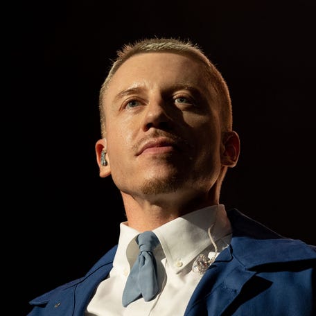 Macklemore performs on stage at the Zenith de la Villette in Paris, on April 18, 2023.