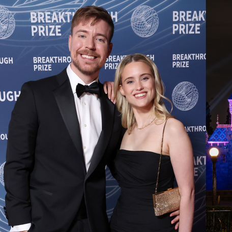 Left: MrBeast and Thea Booysen attend the 11th Breakthrough Prize Ceremony at Barker Hangar on April 5, 2025 in Santa Monica, California. Right: In this handout photo provided by Disneyland Resort, a view of Sleeping Beauty Castle in Disneyland Park illuminated on April 26, 2021 at Disneyland Resort in Anaheim, California.