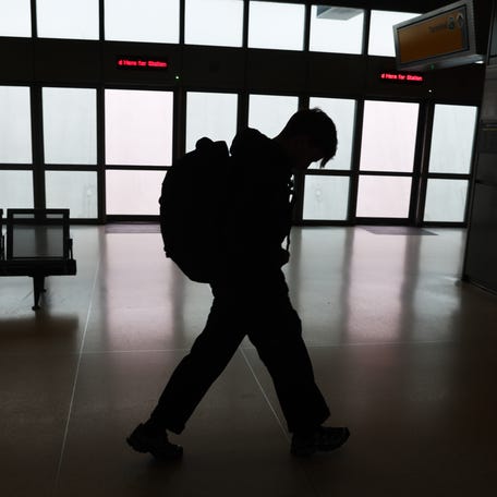Travelers walk through Newark Liberty International Airport on May 23, 2025, in Newark, New Jersey.