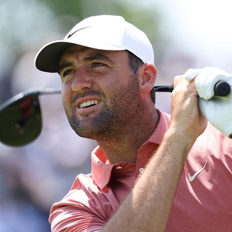 Scottie Scheffler plays a shot from the 12th tee during a practice round for the U.S. Open golf tournament at Oakmont Country Club on Jun 11, 2025.