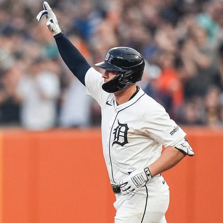 Spencer Torkelson rounds the bases after hitting a home run against the Cubs.
